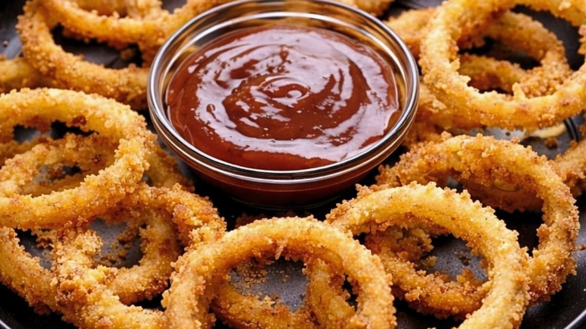 Imagem ilustrativa da receita ANÉIS DE CEBOLA ASSADOS CROCANTES SEM FRITURA