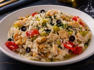 Imagem ilustrativa da receita ARROZ DE BACALHAU COM ALHO-PORÓ E TOMATINHO