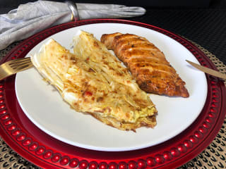 Imagem ilustrativa da receita PEITO DE FRANGO COM ACELGA GRATINADA AO MOLHO CAESAR